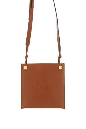 Valentino Garavani Rockstud Logo Embossed Crossbody Bag